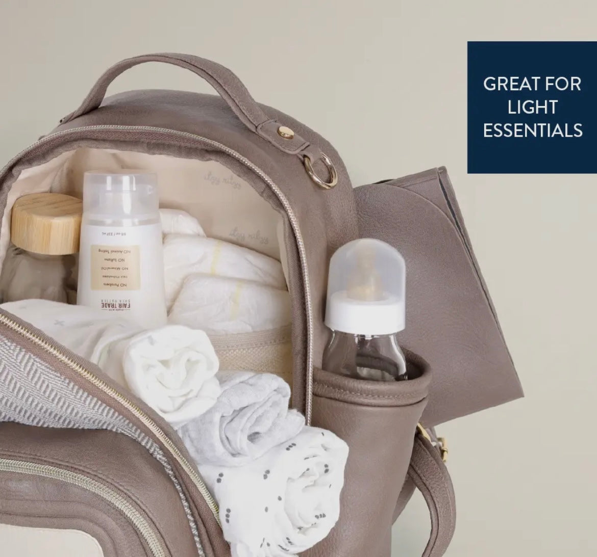 Vanilla Latte Itzy Mini Plus Diaper
Bag Backpack