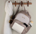 Vanilla Latte Itzy Mini Plus Diaper
Bag Backpack